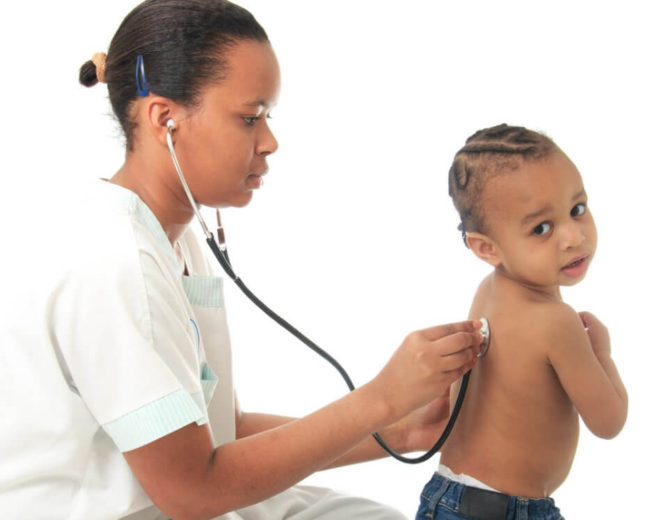 nurse checking child's back with stethoscope